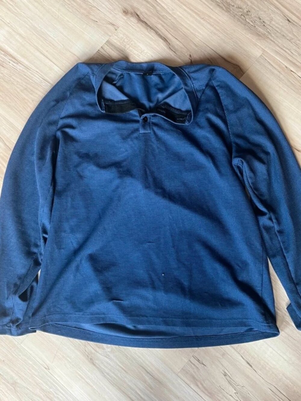 Navy blue waffle-knit long-sleeve performance polo